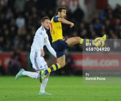 Flamini stuck to Sigurdsson like <enter simile here>