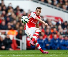 Özil slots a free kick against Liverpool
