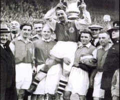 Alex James in happier times: holding the 1936 FA Cup
