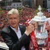 Wenger poses with the FA Cup in 2014. (Photo by Stuart MacFarlane/Arsenal FC via Getty Images)