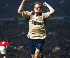 Freddie celebrates after winning the Title and the Double at Old Trafford
