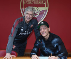 Ozil signs