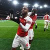 LONDON, ENGLAND - NOVEMBER 03:  (L) Alex Lacazette celebrates scoring the Arsenal goal with Danny Welbeck during the Premier League match between Arsenal FC and Liverpool FC at Emirates Stadium on November 3, 2018 in London, United Kingdom.  (Photo by Stuart MacFarlane/Arsenal FC via Getty Images)