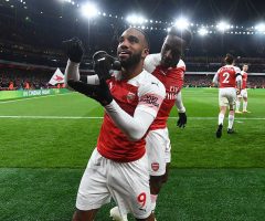 LONDON, ENGLAND - NOVEMBER 03:  (L) Alex Lacazette celebrates scoring the Arsenal goal with Danny Welbeck during the Premier League match between Arsenal FC and Liverpool FC at Emirates Stadium on November 3, 2018 in London, United Kingdom.  (Photo by Stuart MacFarlane/Arsenal FC via Getty Images)