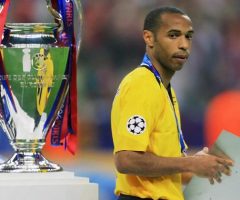Thierry Henry looks ruefully at the Champions League trophy