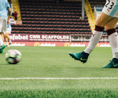 Group of people playing soccer